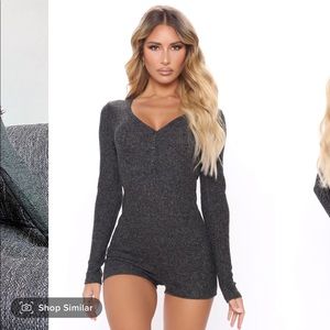 Bedtime romper. Has buttons